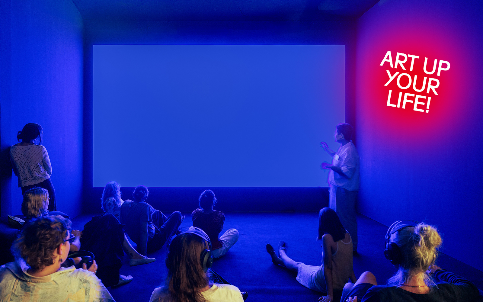 A blue room with a blue screen.