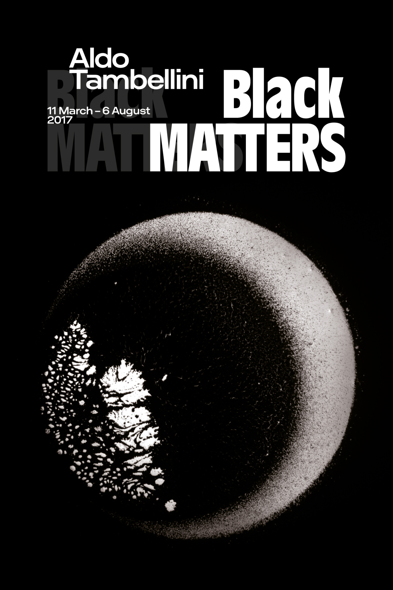 Black cover with white font and circular illustration.