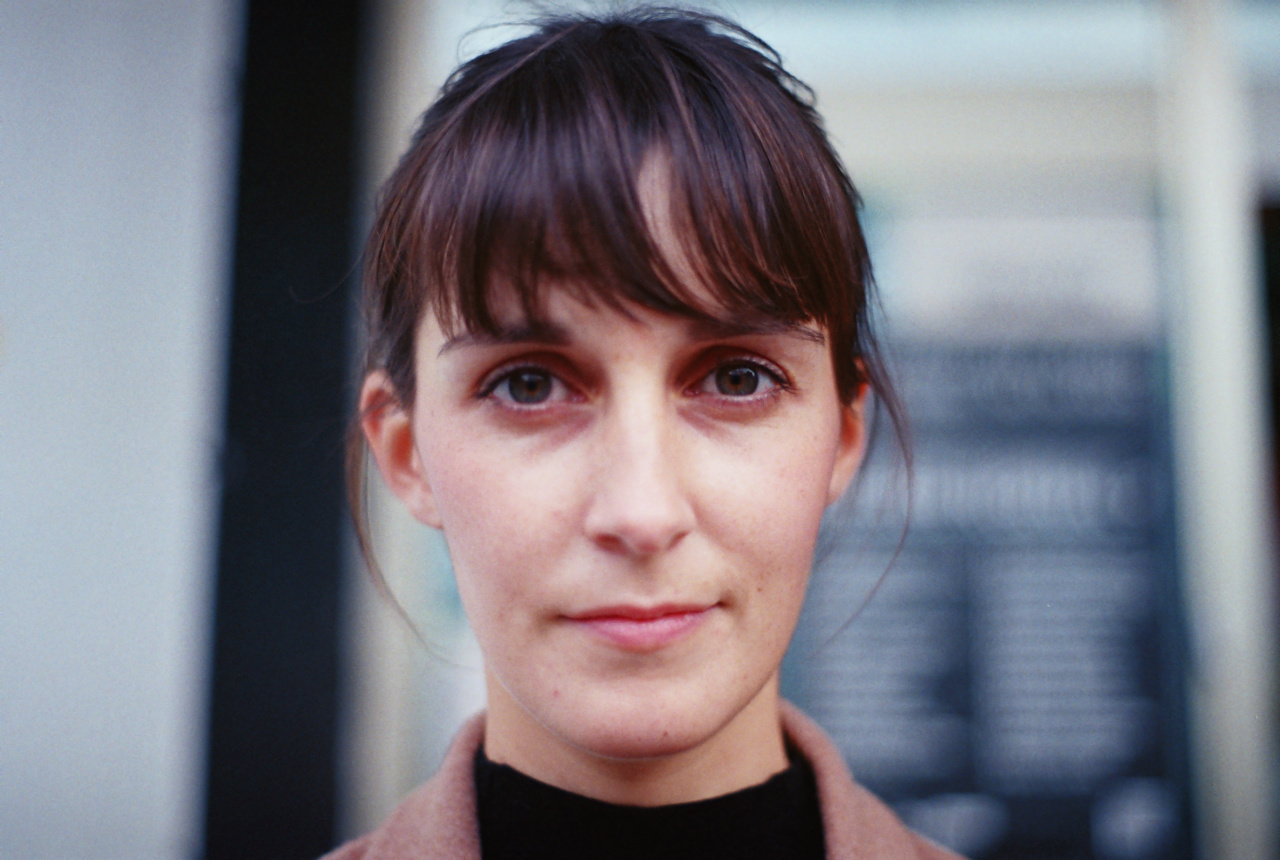 Zu sehen ist das Portraitfoto einer Person. 