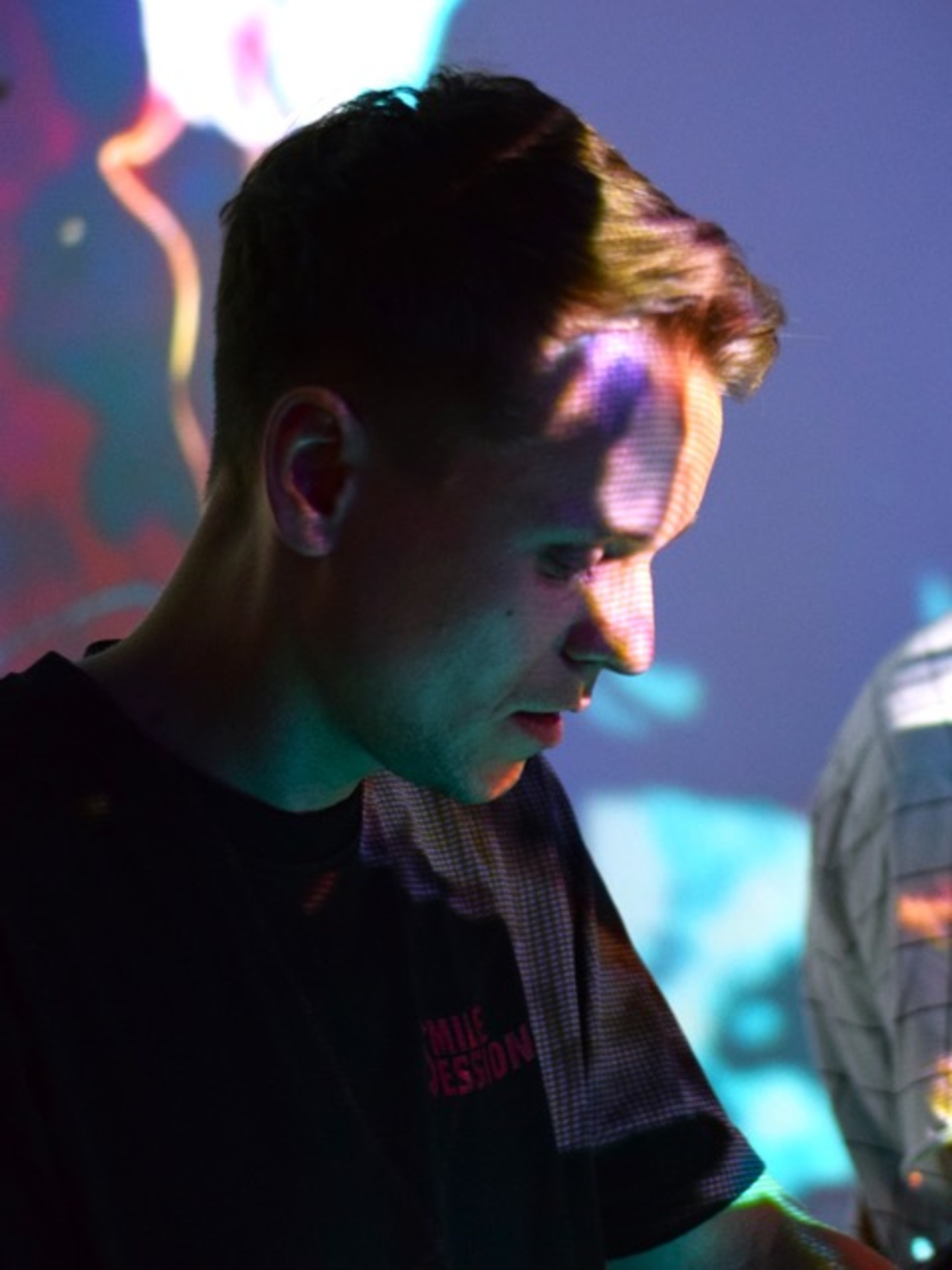 The picture shows a face illuminated by atmospheric light.