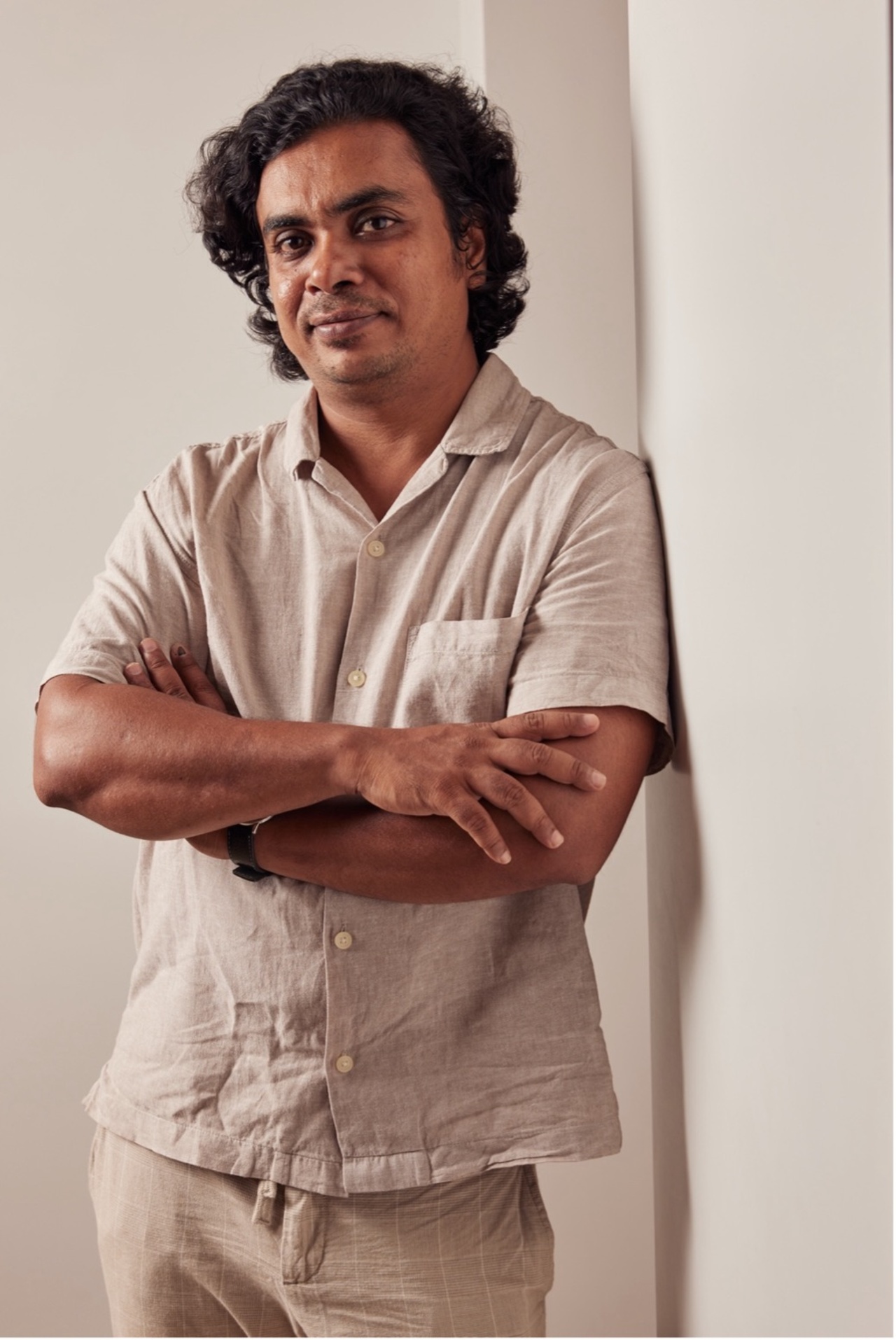 A portrait photo of a person is shown.