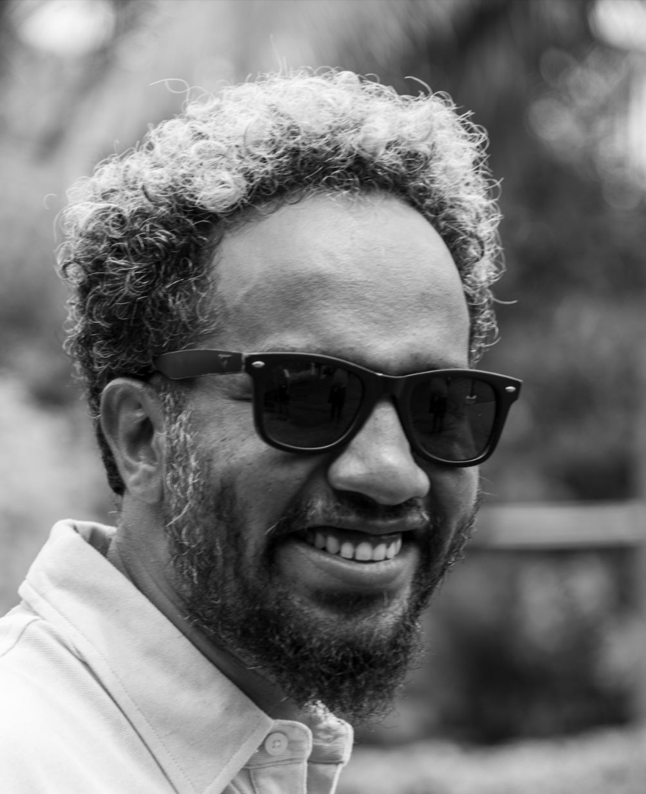 Zu sehen ist das Portraitfoto einer Person. 