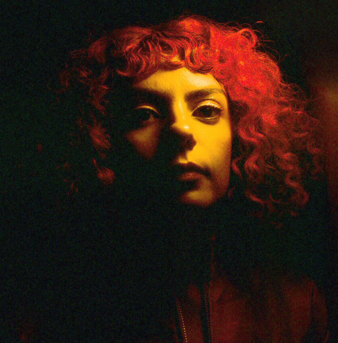 A portrait photo of a person is shown. 