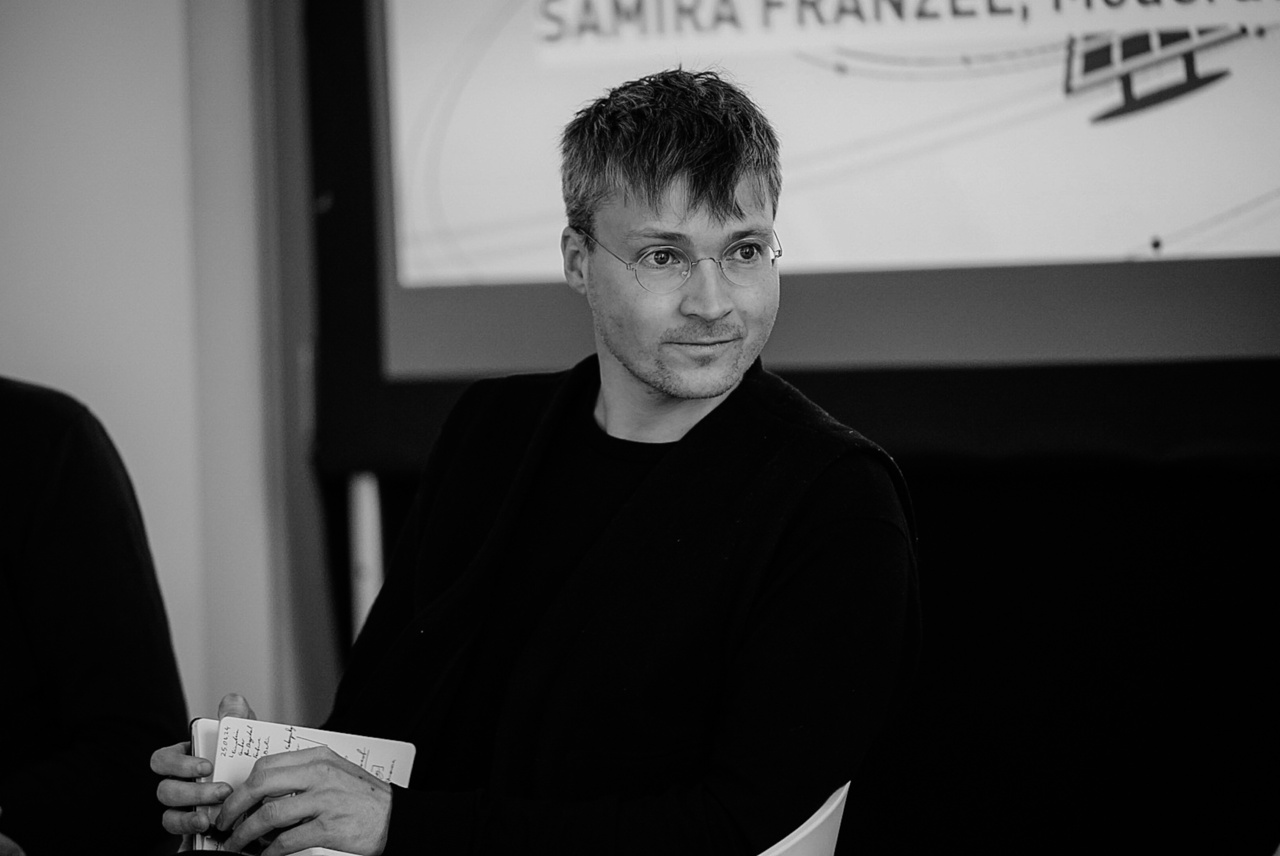 A portrait photo of Kim Albrecht is shown. 