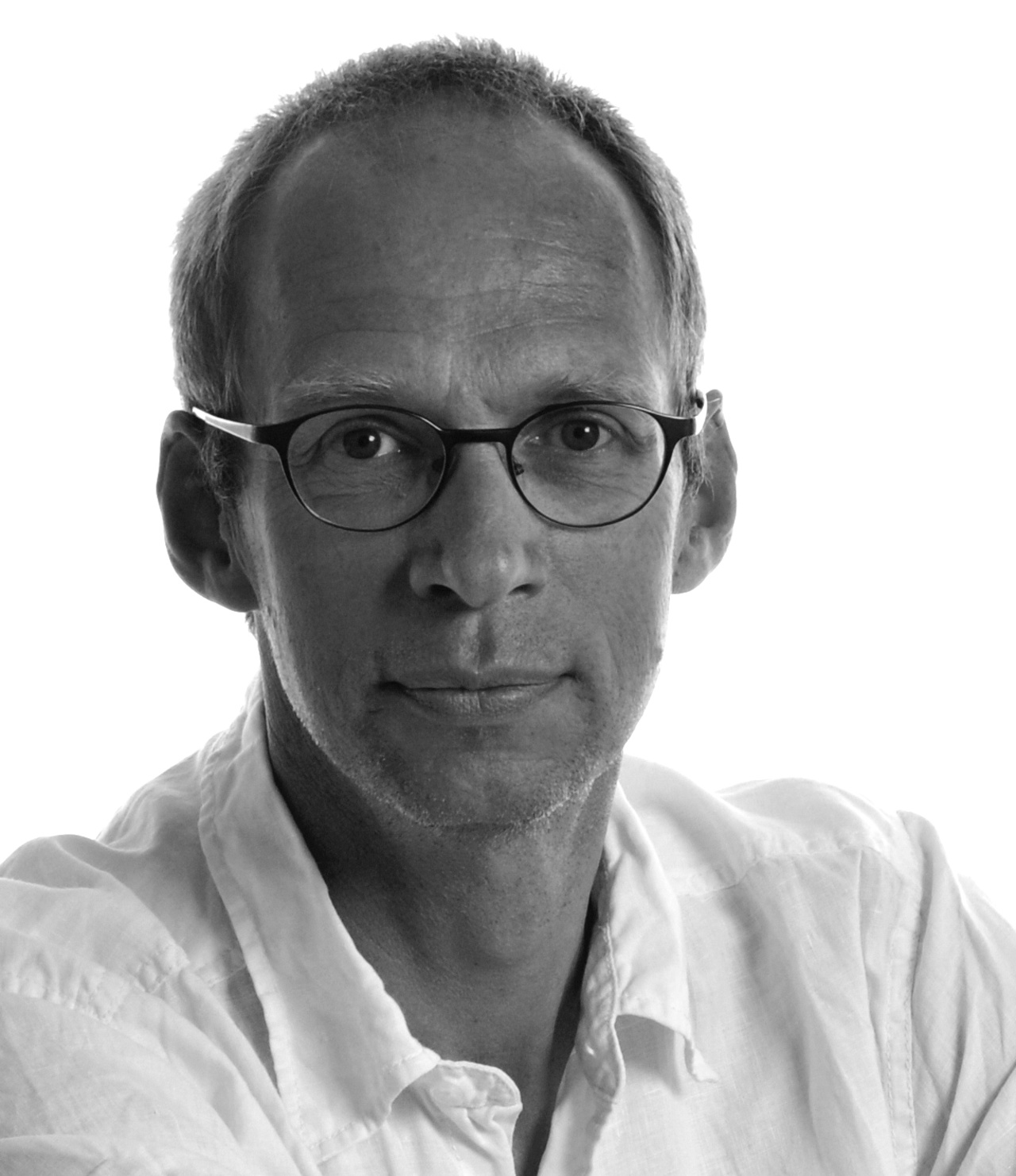 Zu sehen ist ein Portraitfoto von Heiner Igel.