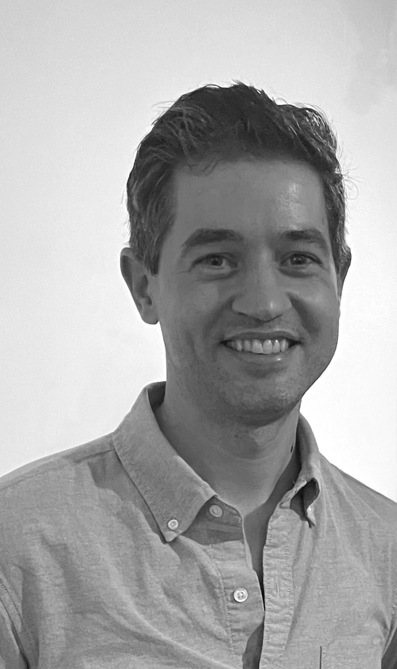 Zu sehen ist ein Portraitfoto von Paul Galloway.