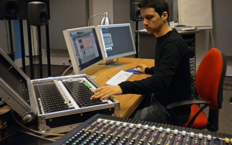 Ignacio Pecino in front of computers and sound mixer