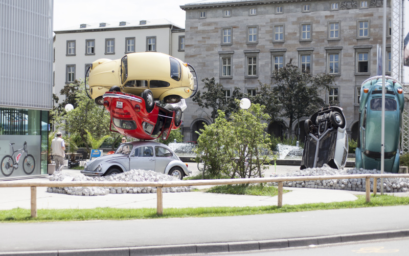 Stacked VW beetles in different colors