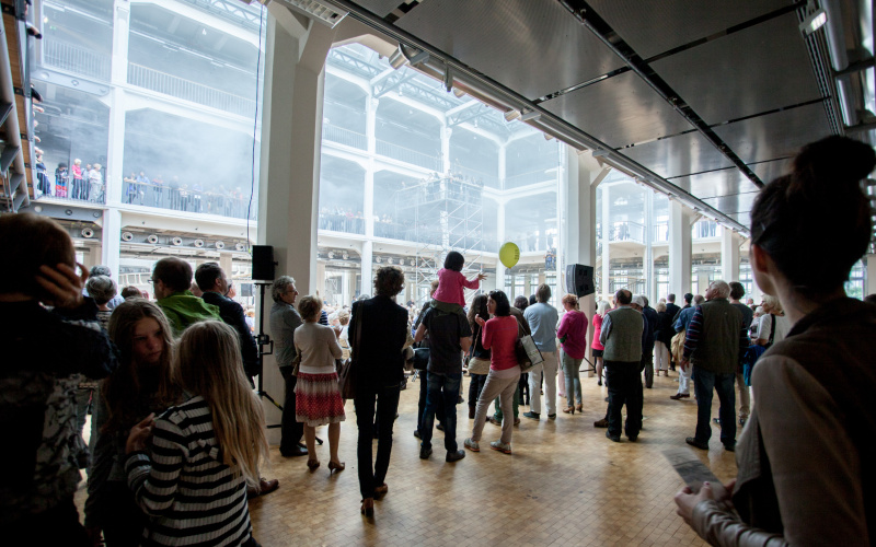 Several pople at the opening of the cloudscapes exhibition