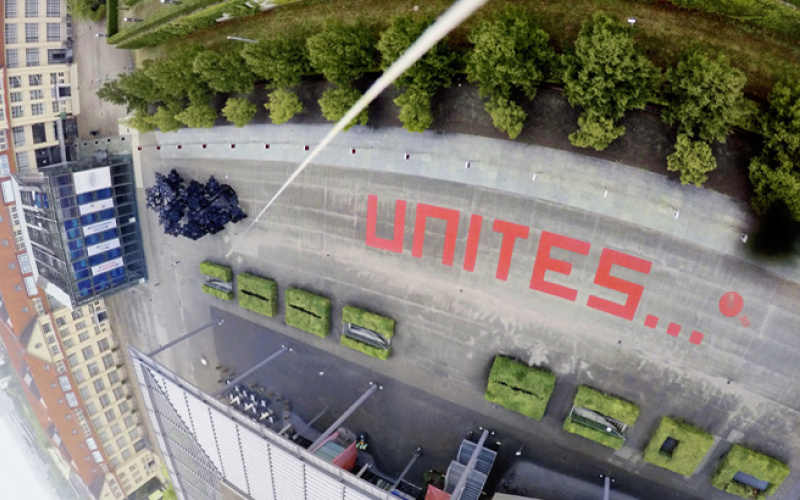 The word "unites" in red letters on the ZKM_Forecourt