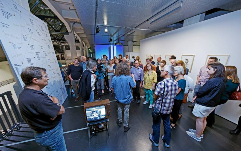 People at the exhibition space