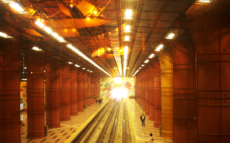 A metro station dipped in golden light