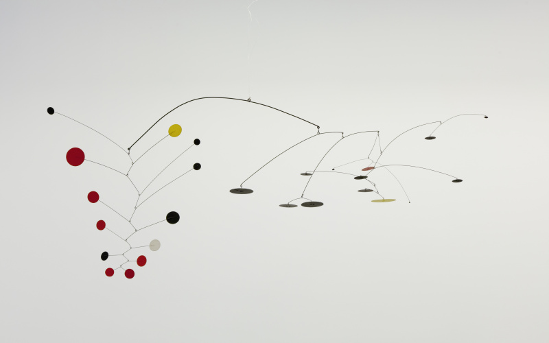 Mobile made of metal and small colorful round discs