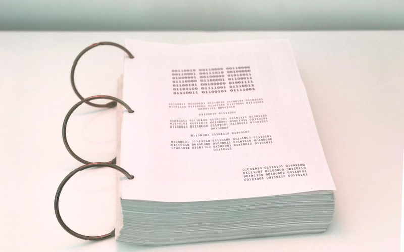 A binary code screenplay with ring binding