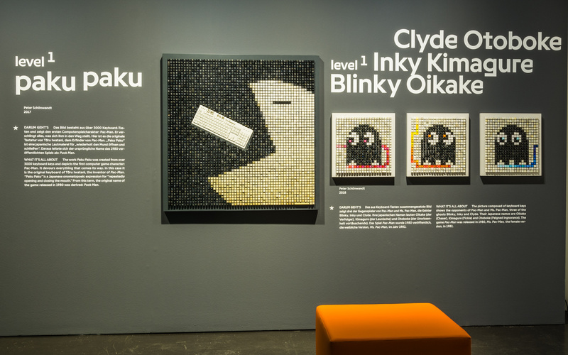 Photography from four artworks made out of keyboard keys in shape of pac man and his enemies.