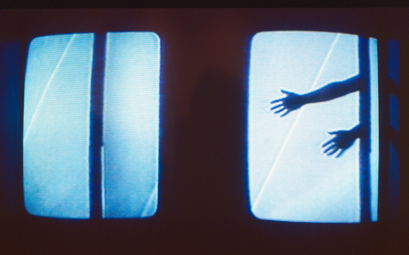 One screen shows a single-channel video in Umatic video format, the work is called »Perpetuum mobile I« and was created by Michael Bielicky.