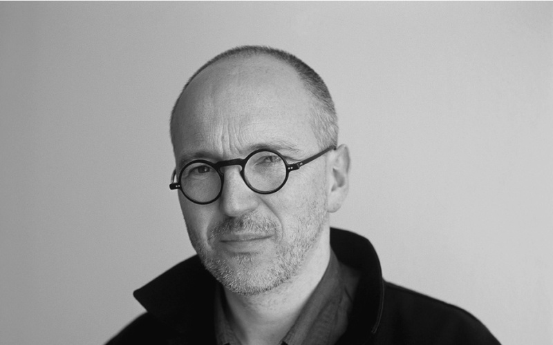 A black and white portrait of the artist Ecke Bonk