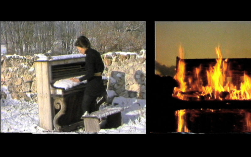 There are two pictures on a black background. The left picture shows a piano in a snowy landscape with a woman walking towards it. The right picture shows a burning piano at night.