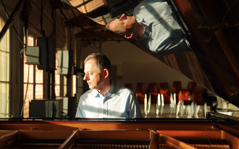 The picture shows a man playing the piano.