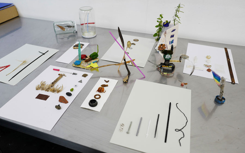 An overview of different materials lies on a table.