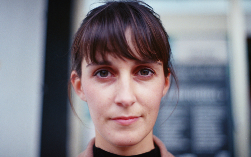 Zu sehen ist das Portraitfoto einer Person. 