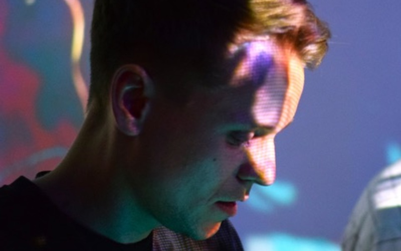 The picture shows a face illuminated by atmospheric light.