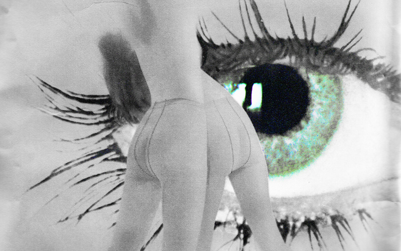 A big blue eye, in front: two lower bodies from the back in pants