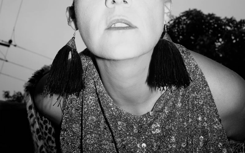 A portrait photo of a person is shown.