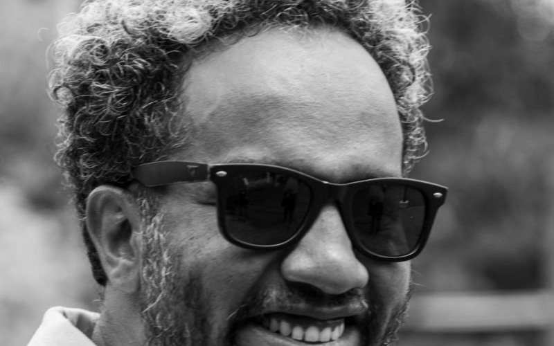 Zu sehen ist das Portraitfoto einer Person. 