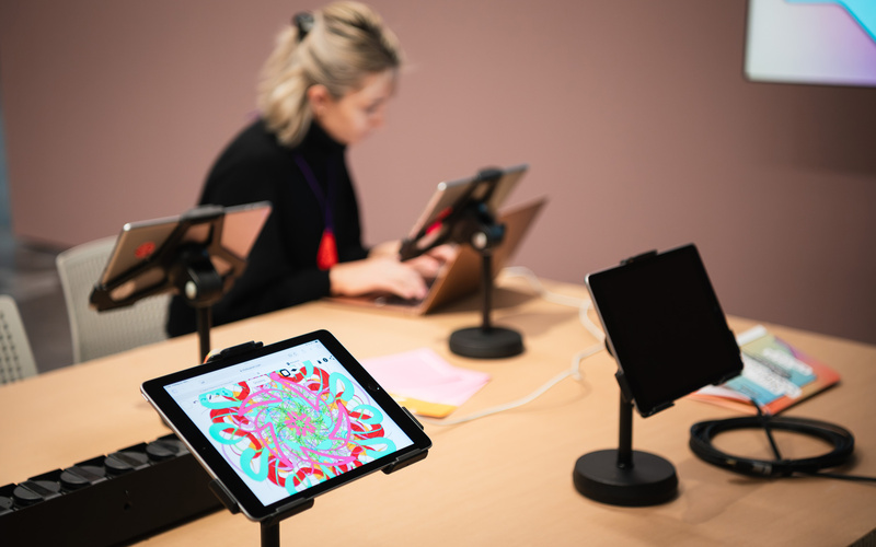 The picture shows several tablets on a table.