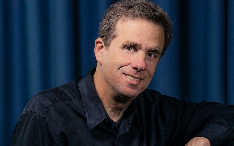 The portrait photo of a person is shown.