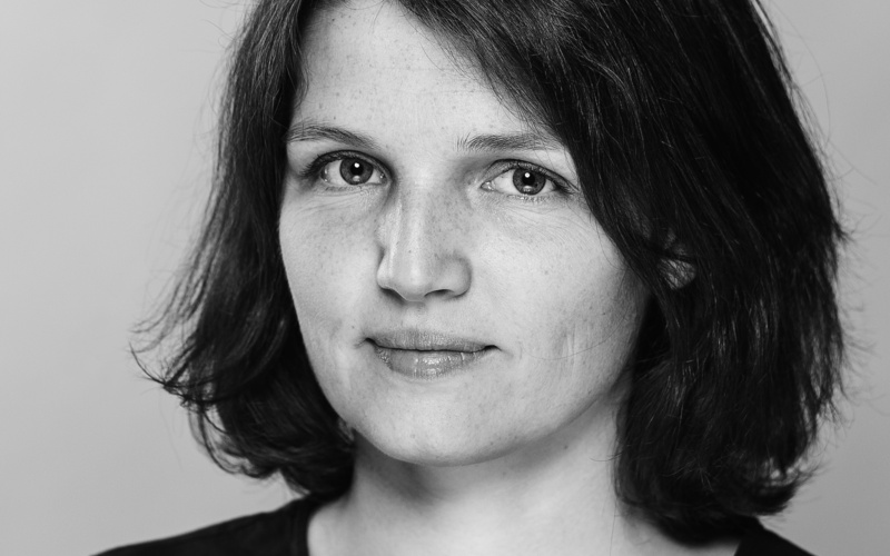 A portrait photo of Daria Mille is shown. 