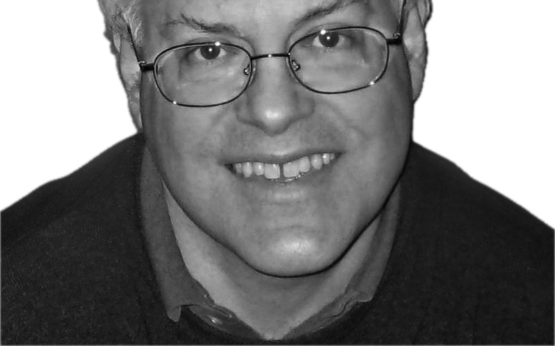 A portrait photo of Joseph Bates is shown. 