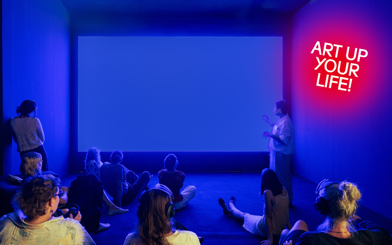 A blue room with a blue screen.