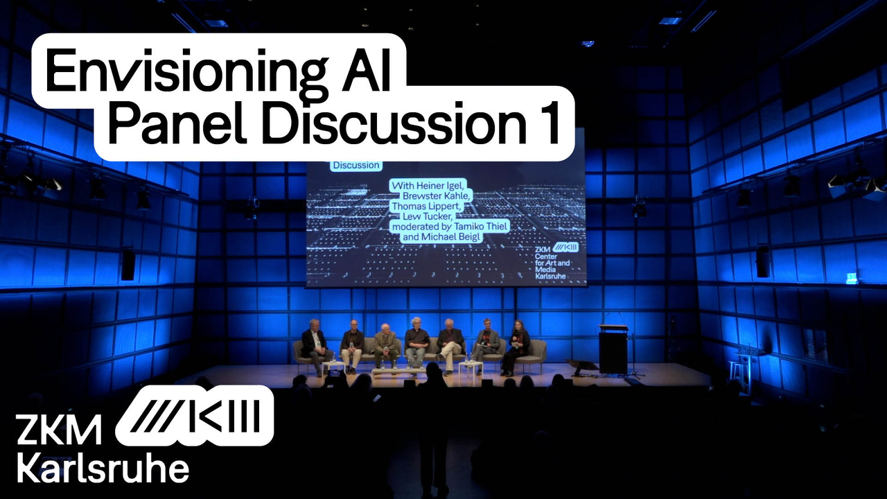 People are sitting on stage