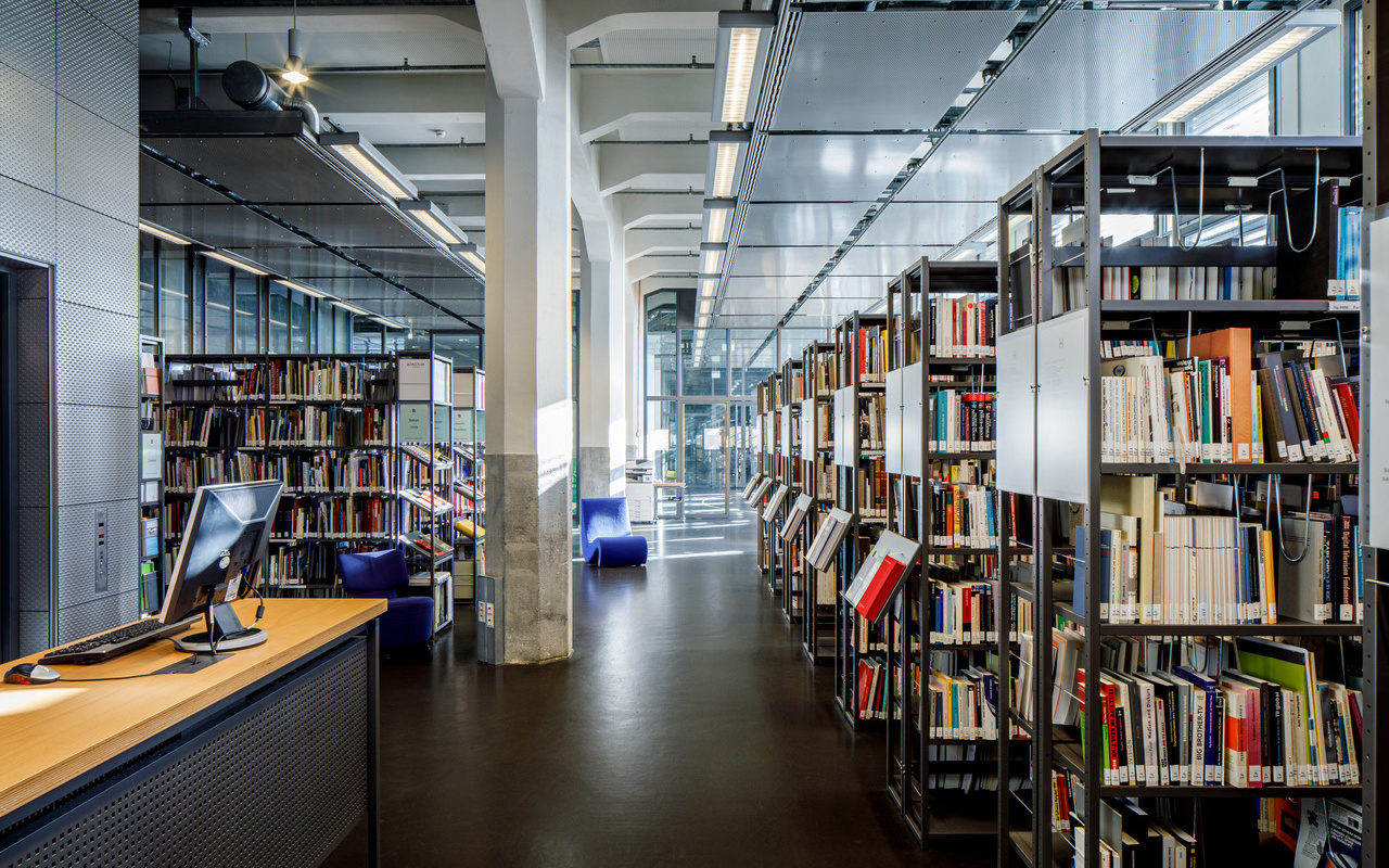 You can see many shelves filled with books.