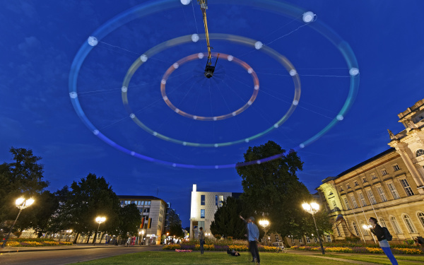 A huge colored centrifugal in Karlsruhe night sky