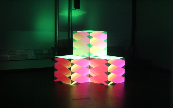 Three stacked colored cubes