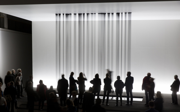 Several beams black liquid flowing from the ceiling