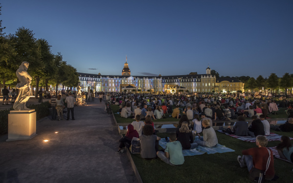 The Karlsruhe Palace is bathed in colorful light