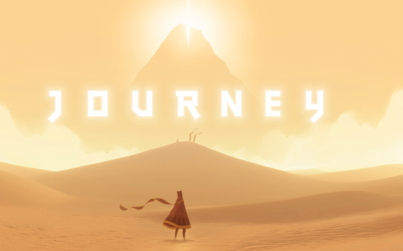 Eine Spielfigursteht in der Wüste vor einem Berg, darüber steht der Schriftzug »Journey«