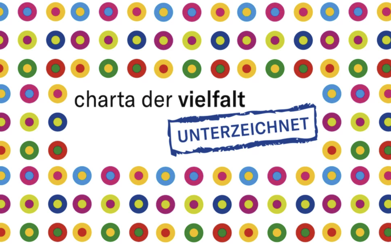 Logo der "Charta der Vielfalt" mit vielen bunten Punkten