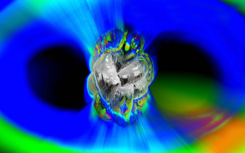 A silver structure against a blue-green background